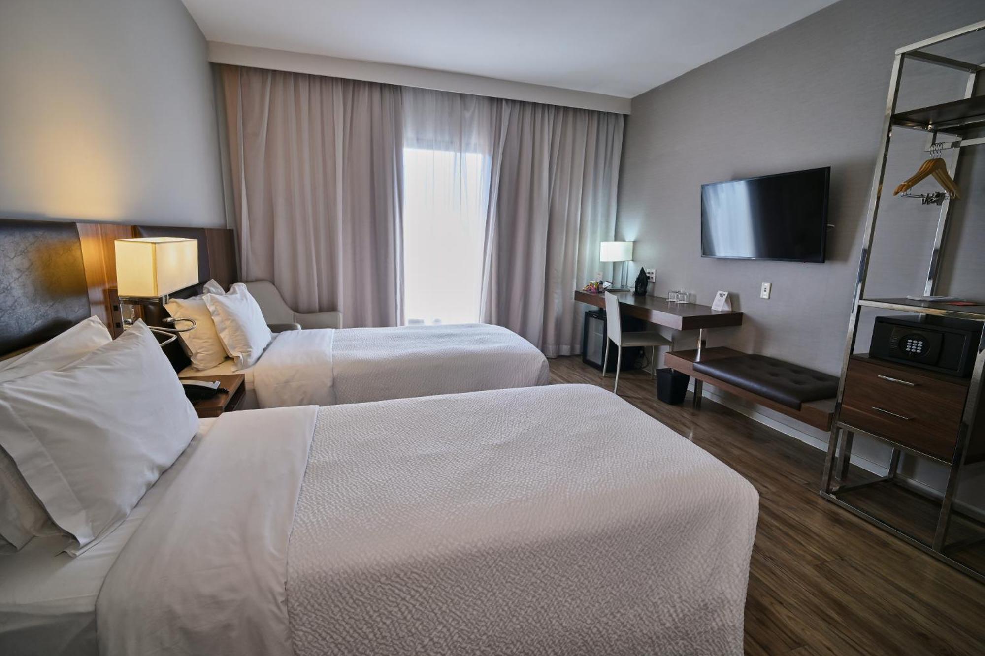 Quarto Deluxe com 2 Camas de Solteiro